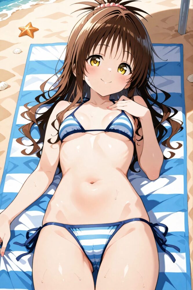 マイクロビキニでビーチに寝そべる結城美柑